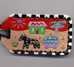 It Takes a Village leather luggage tag