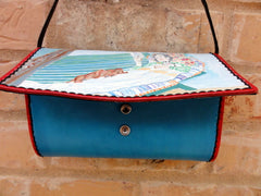Purse with Woman Reclining on a Bench